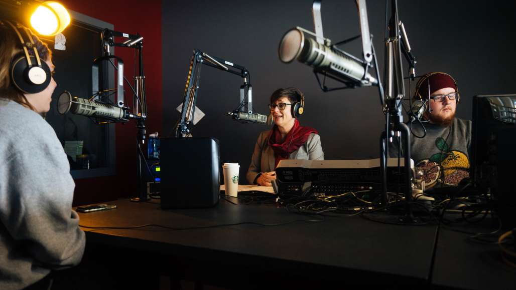 In the WKNH Studio with President Treadwell (center)