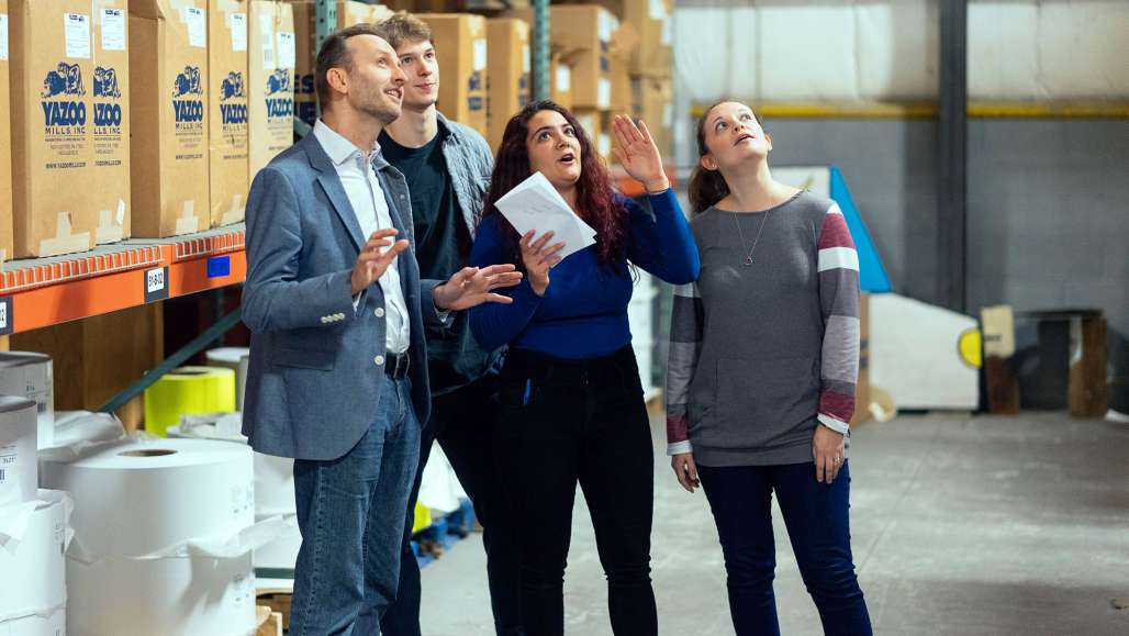 Architecture students tour the renovated Electronic Imaging Materials Inc. facility with Professor Bart Sapeta.