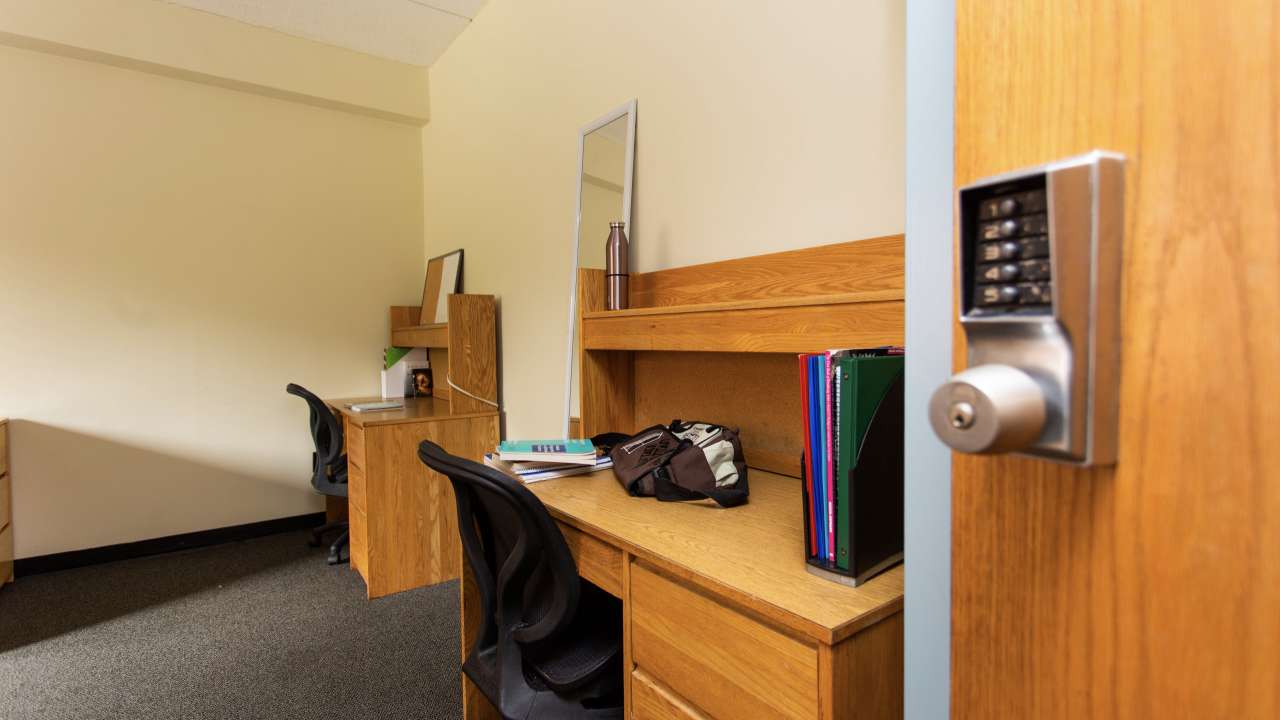 Holloway Hall dorm room, facing desks.