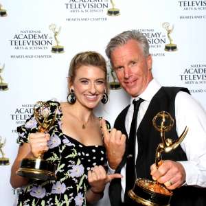 Tom Cole, pictured right, with Katie Eastman after winning a 2019 Regional Emmy Award for his work on Race Across America. Photo courtesy of Tom Cole.