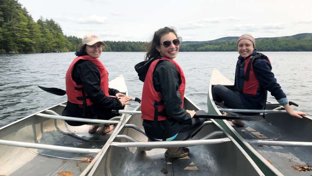 From left, Katelyn Fournier, Kristina Tufo, and Julia Yates doing conservation easement monitoring on Spoonwood Pond.