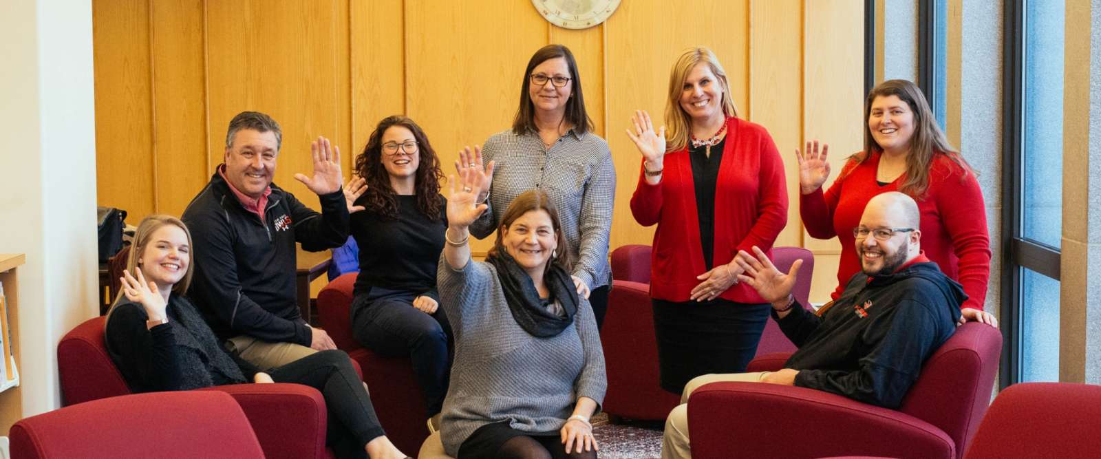 Admissions Counselors in the library