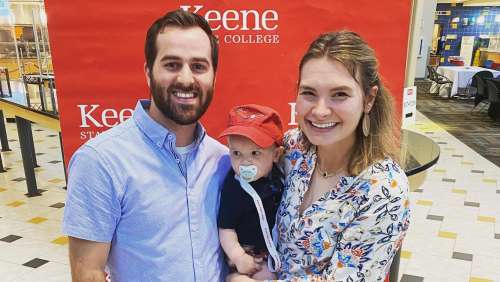 Nate and Allegra Bisson '14 and their son, Keenan, during an alumni event at Keene State