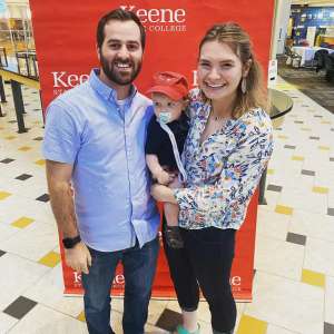 Nate and Allegra Bisson '14 and their son, Keenan, during an alumni event at Keene State