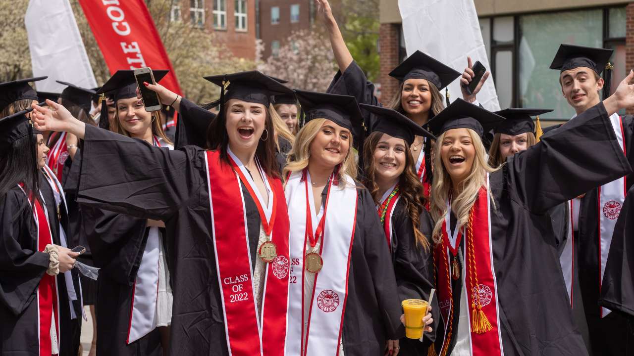 Students cheer while getting ready for the 2022 Commencement ceremony