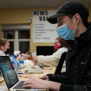 Tom Benoit '23 works on a spring edition of The Equinox