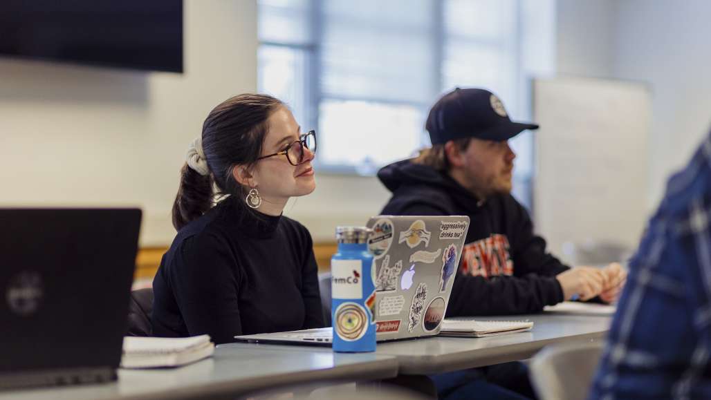 Students sit in a classroom