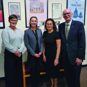 Above, from left, President Melinda Treadwell, Dr. Kate DeConinck, Suzanne Hampel, and Dr. James Beeby