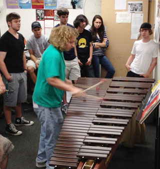 Sophomore and marimba specialist Josh Brennan puts the new instrument through its paces