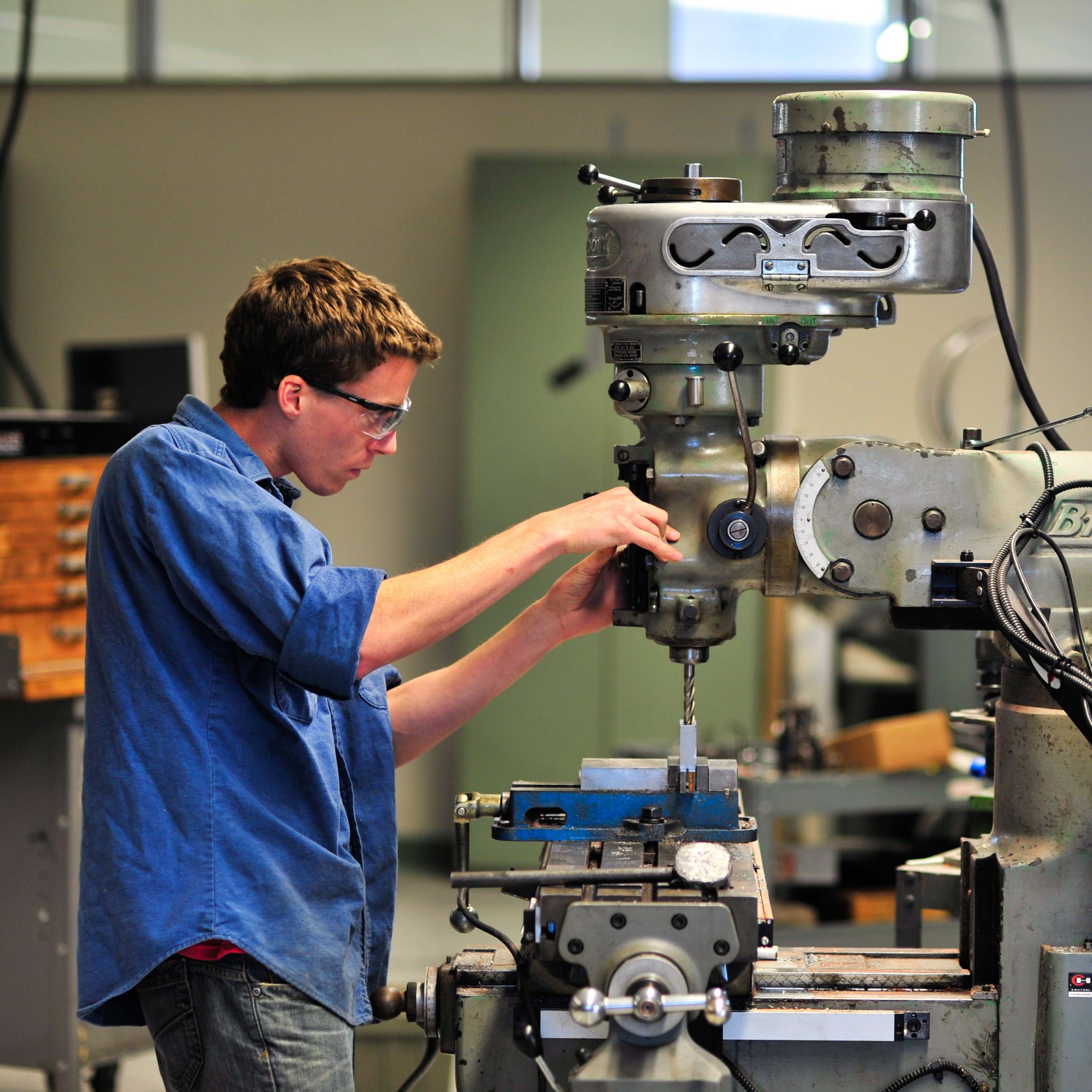 A student at work in the newly constructed TDS Center, where manufacturing classes take place.