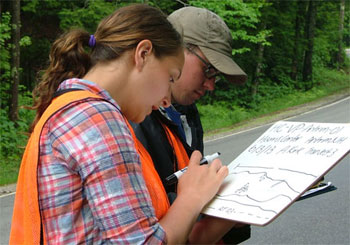 Alexandra Kirk and Stephen Day creating a detailed field sketch of a roadside vernal pool as part of the vernal-pool documentation process.
