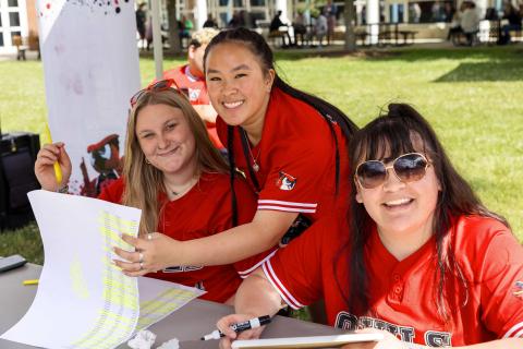 Orientation leaders checking in new students