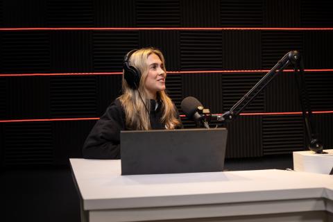 Student in podcast studio