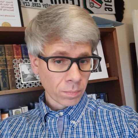 Dr. Brian E. Crim